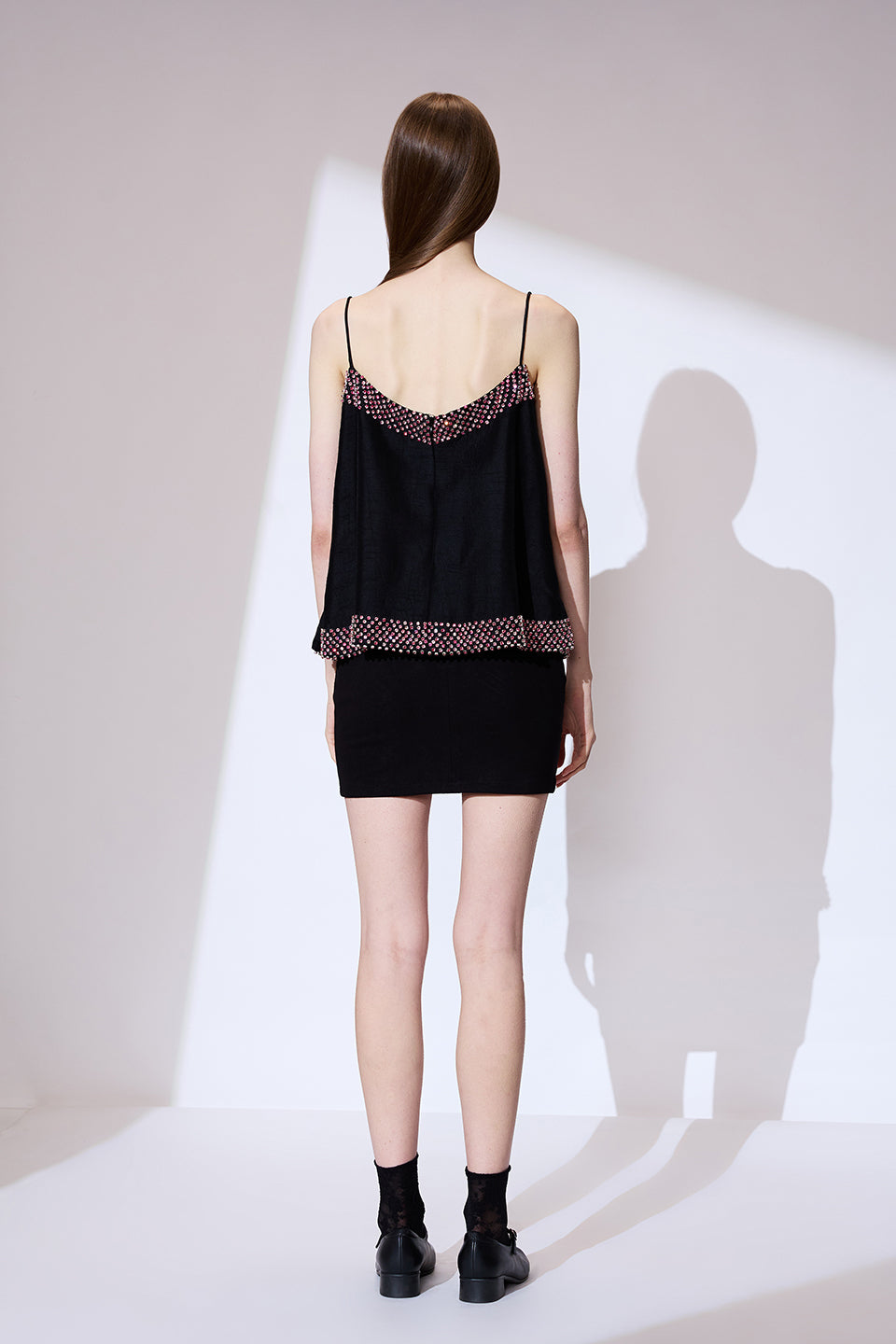 Black and pink embroidered top