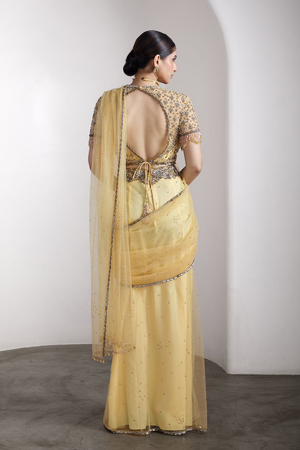 Yellow drapped saree set