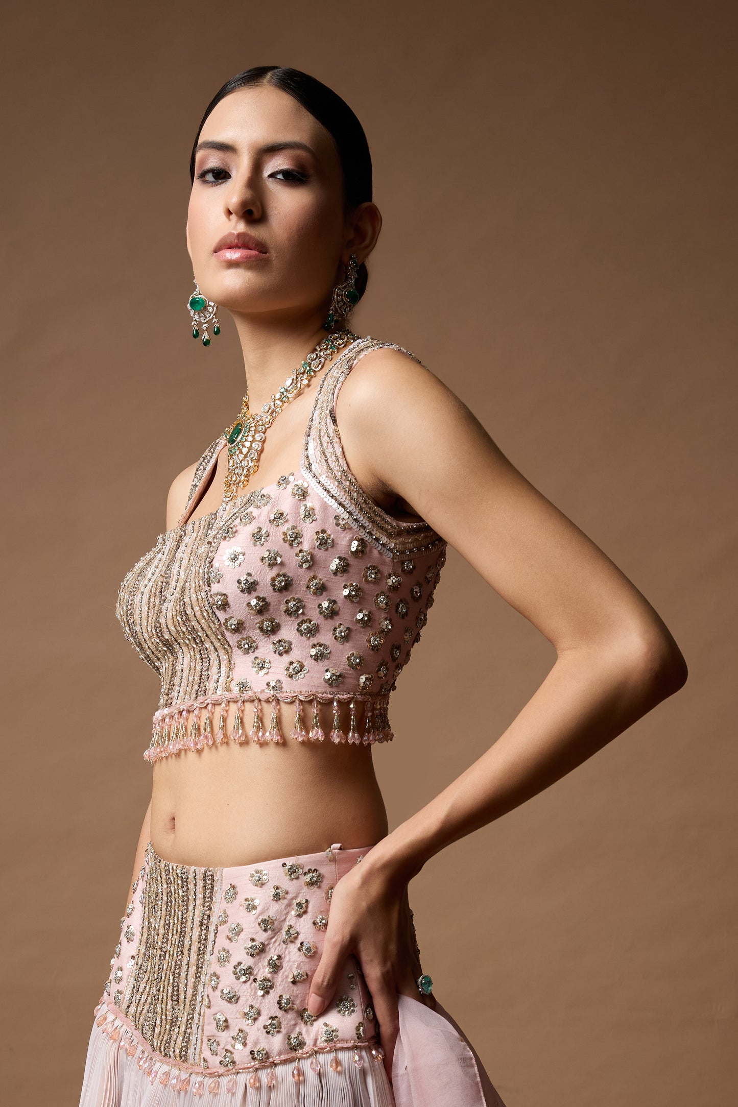 Pink sleevless embriodered blouse with lehenga set