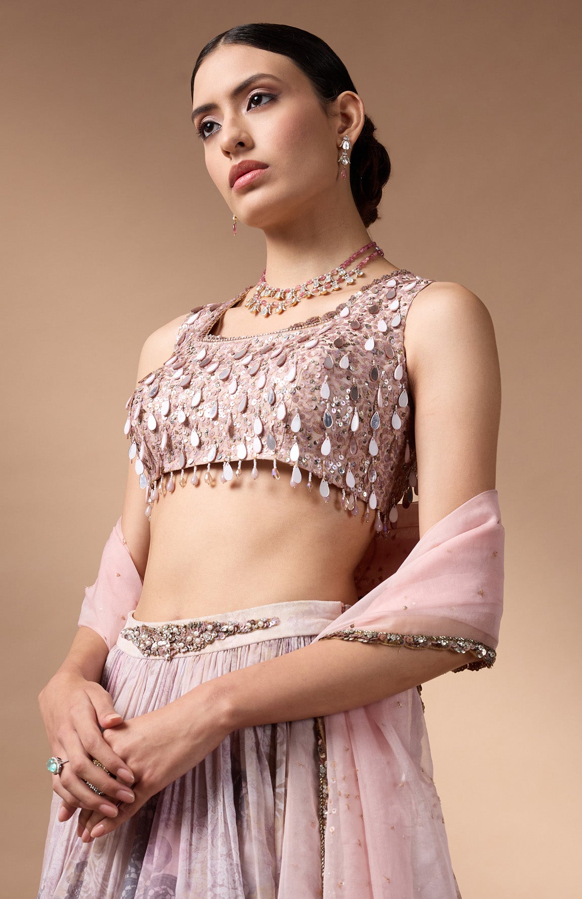 Ivory Sleevless Blouse with printed lehenga