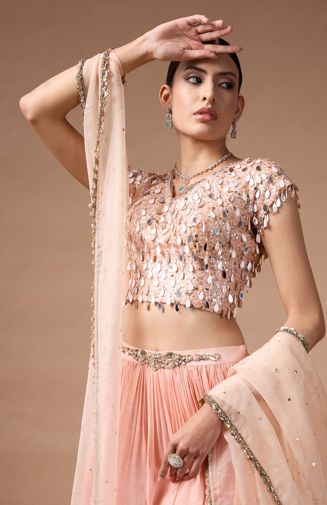 Orange embriodered blouse with printed lehenga