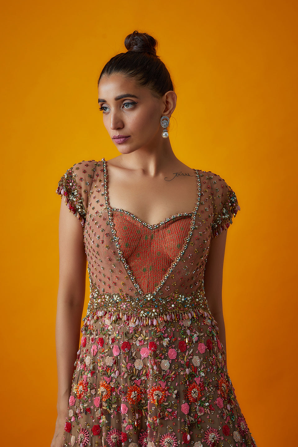 multicoloured embroidered gown with brocade bodice