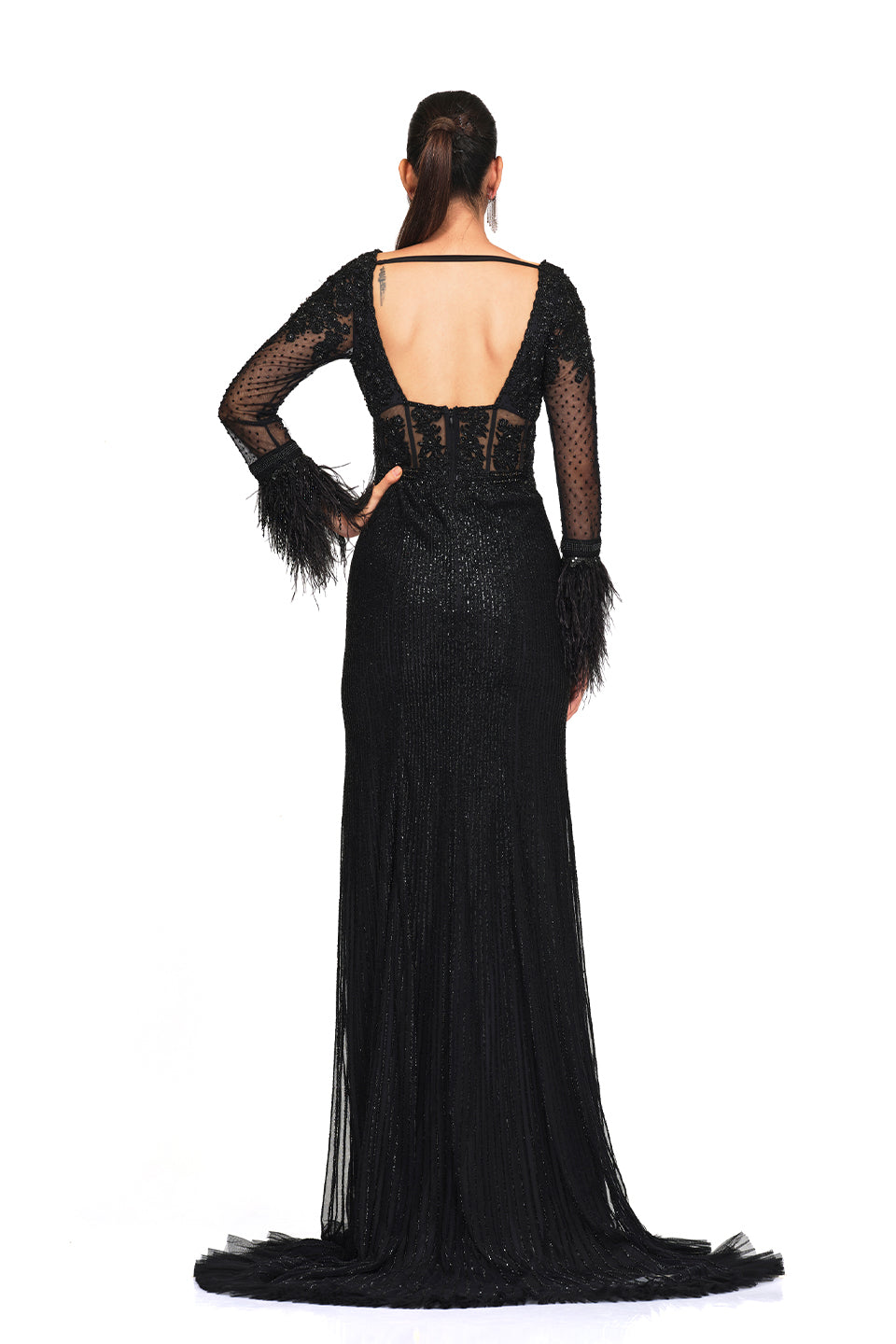 Beaded embroidered gown with feather sleeves