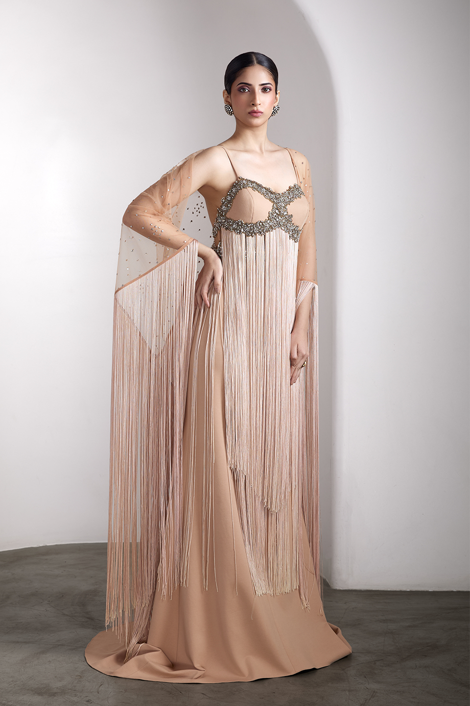 Nude fringe embellished gown