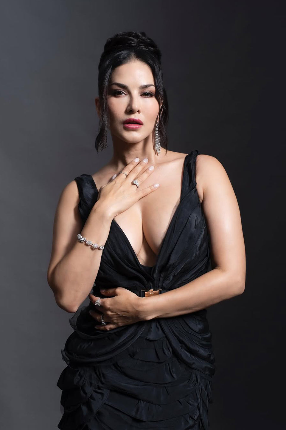 Sunny Leone in Deep v neckline flared gown