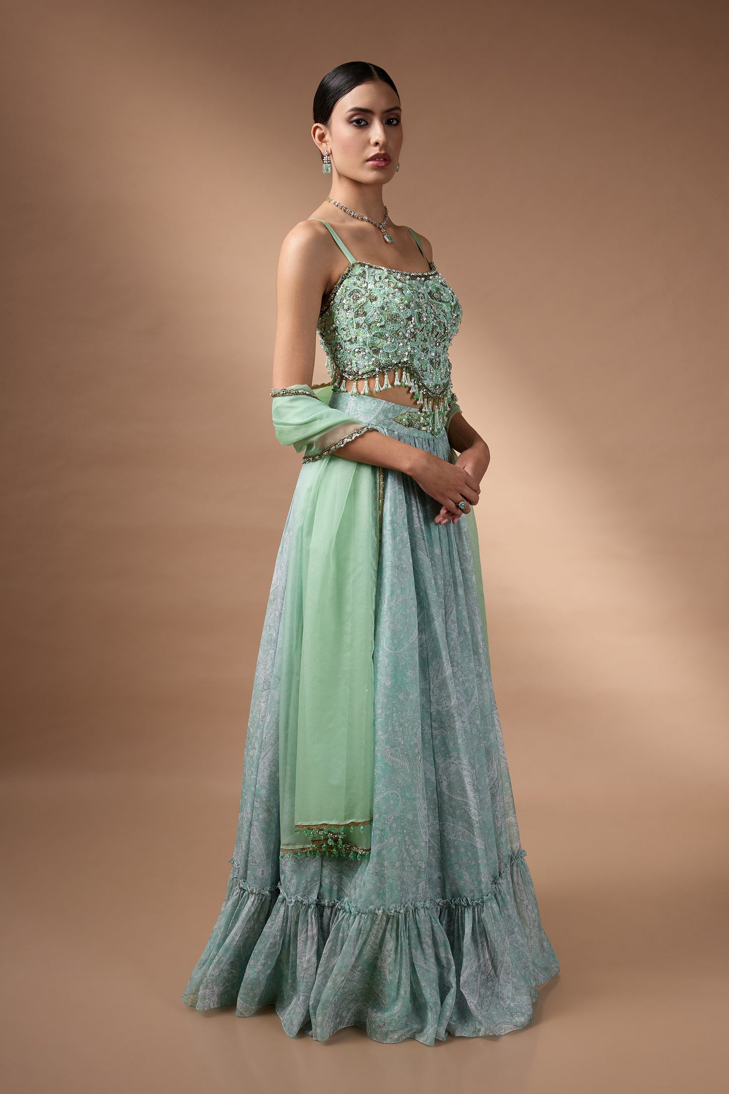 Green Embriodered blouse with floral printed lehenga