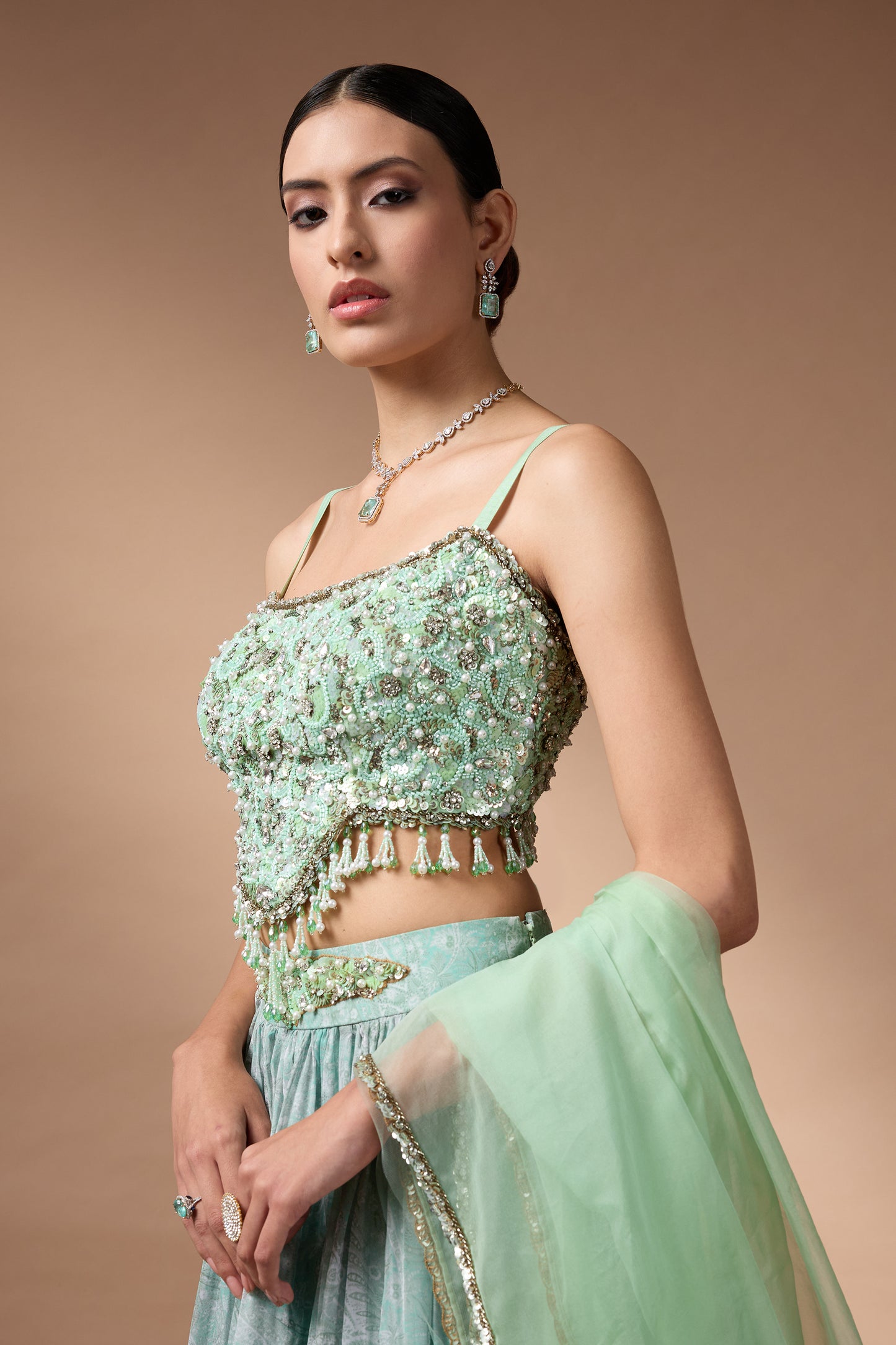 Green Embriodered blouse with floral printed lehenga