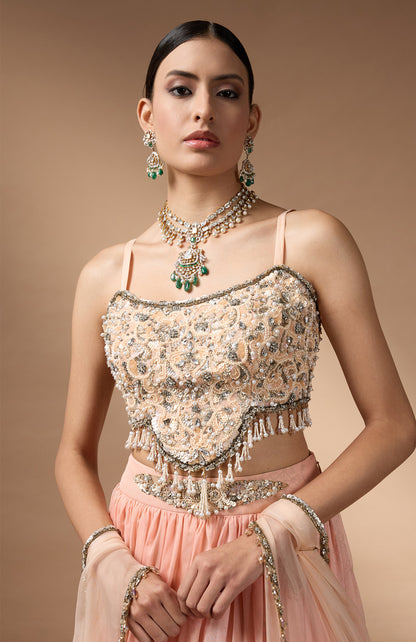 Orange Embriodered blouse with floral printed lehenga