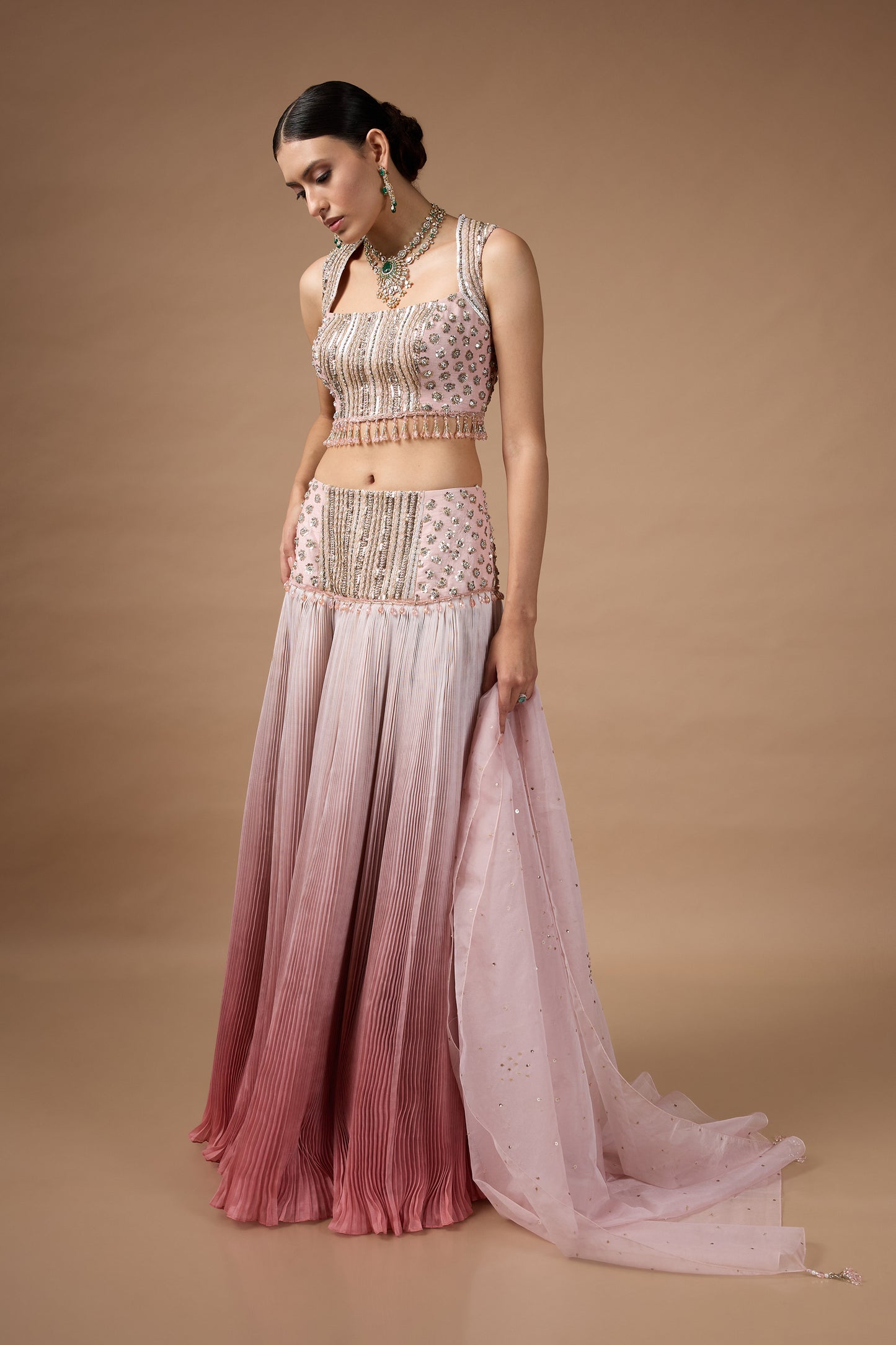 Pink sleevless embriodered blouse with lehenga set