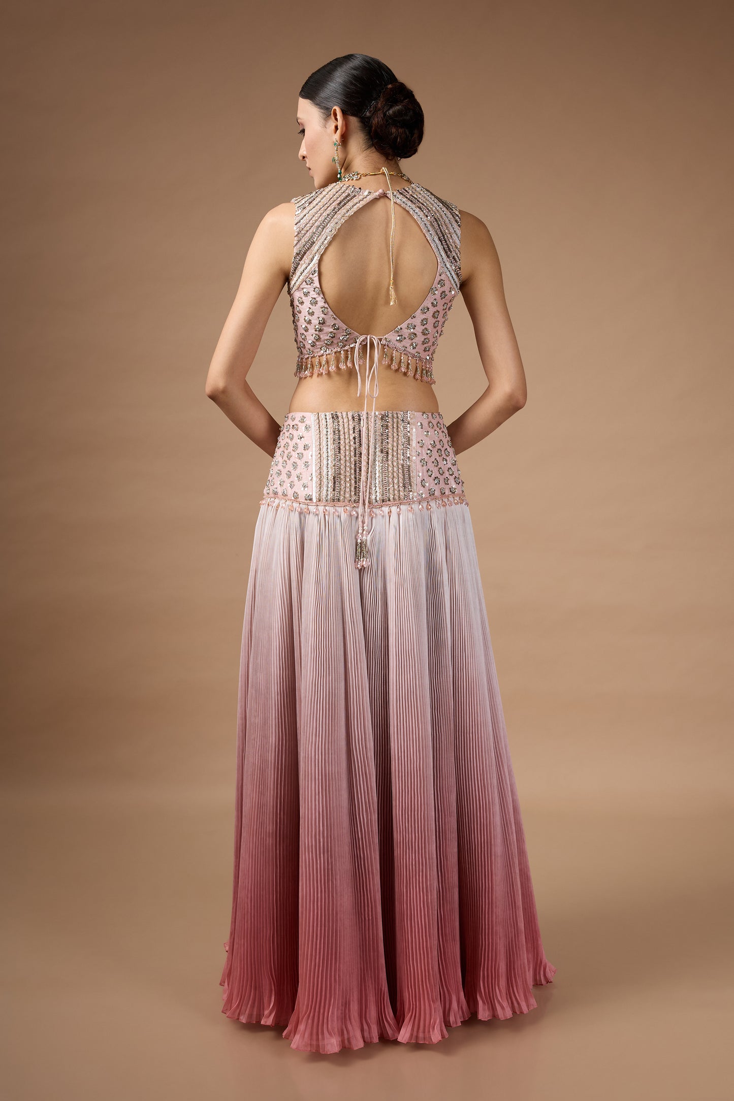 Pink sleevless embriodered blouse with lehenga set