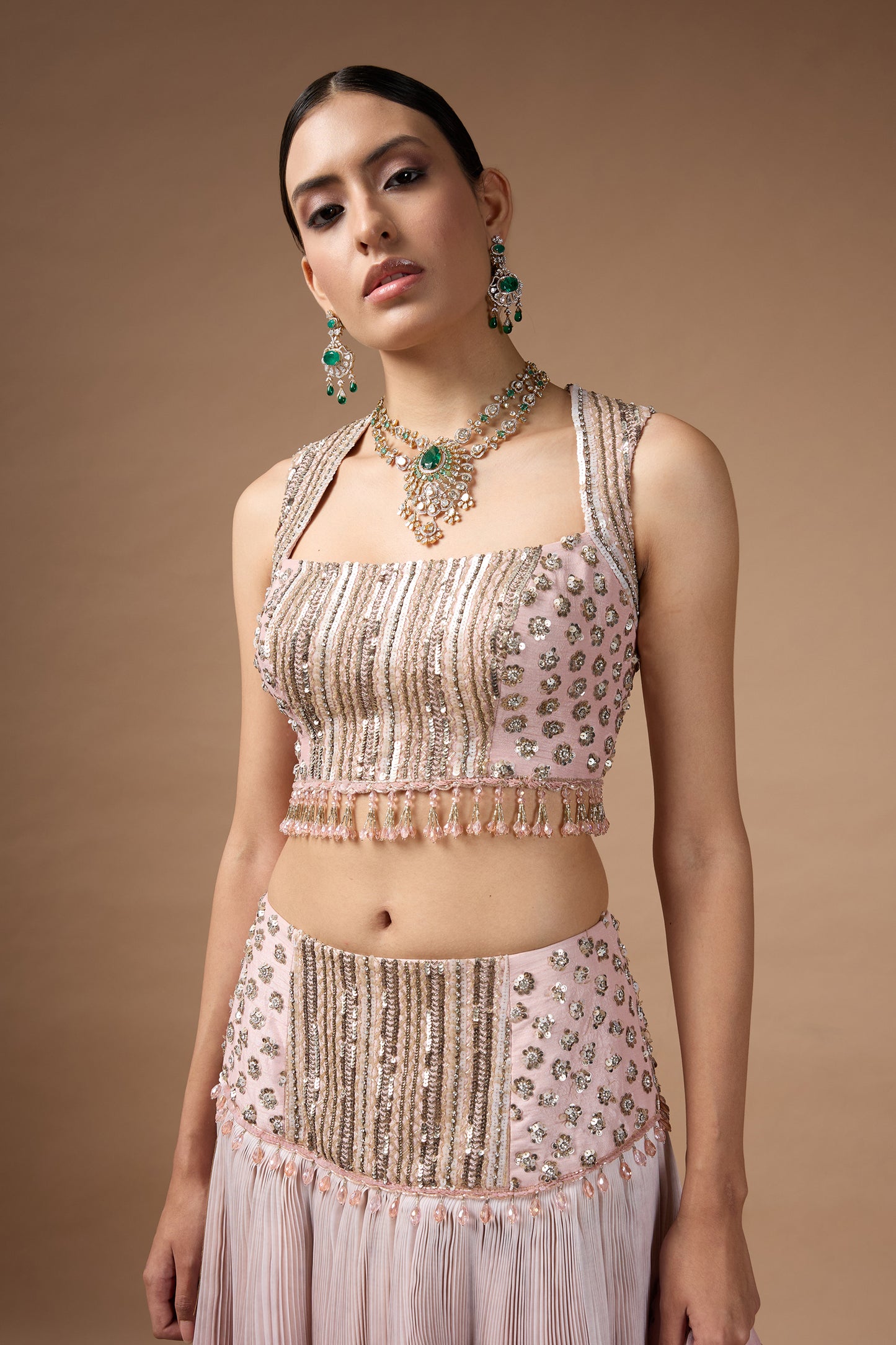 Pink sleevless embriodered blouse with lehenga set