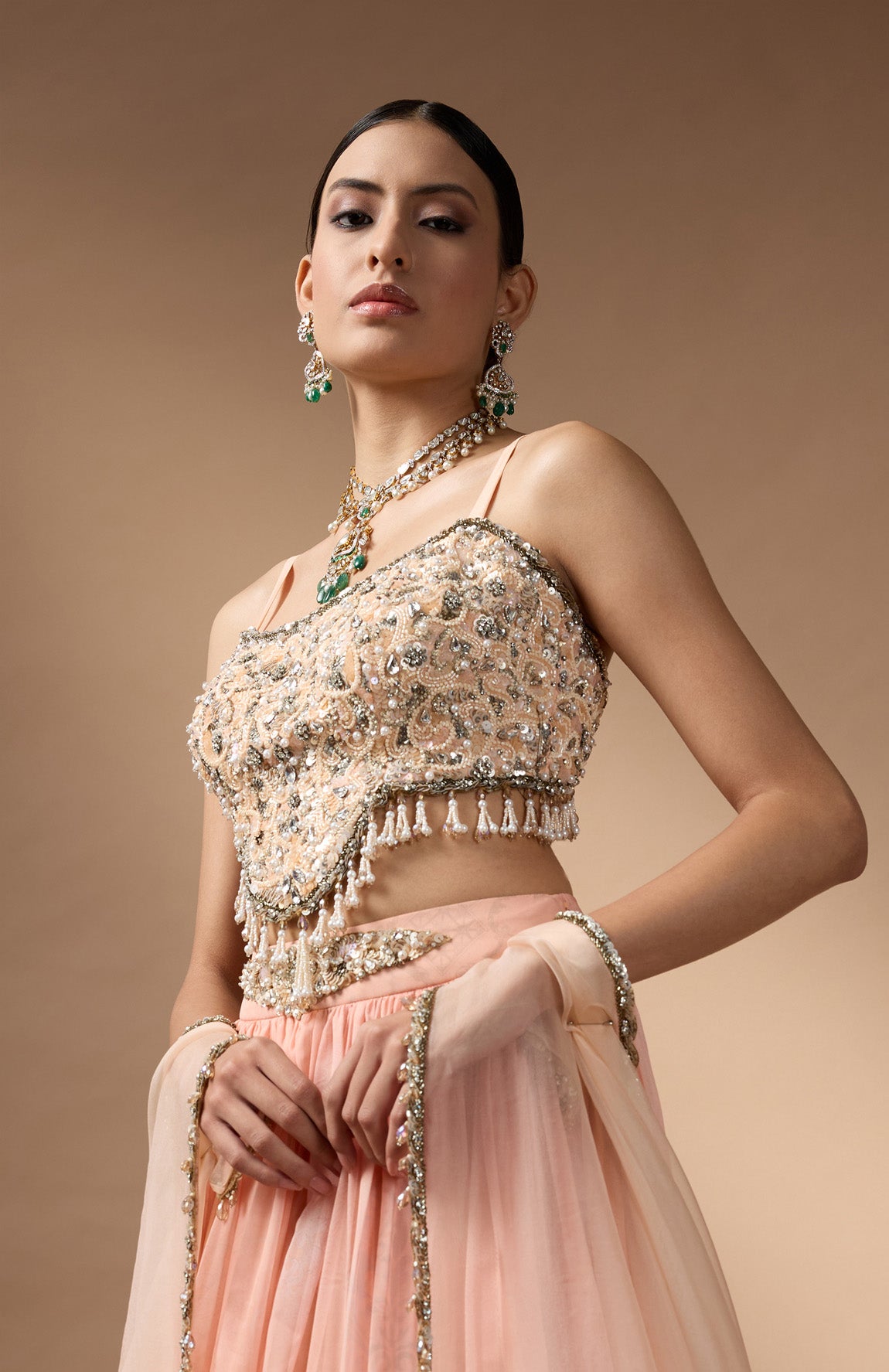 Orange Embriodered blouse with floral printed lehenga