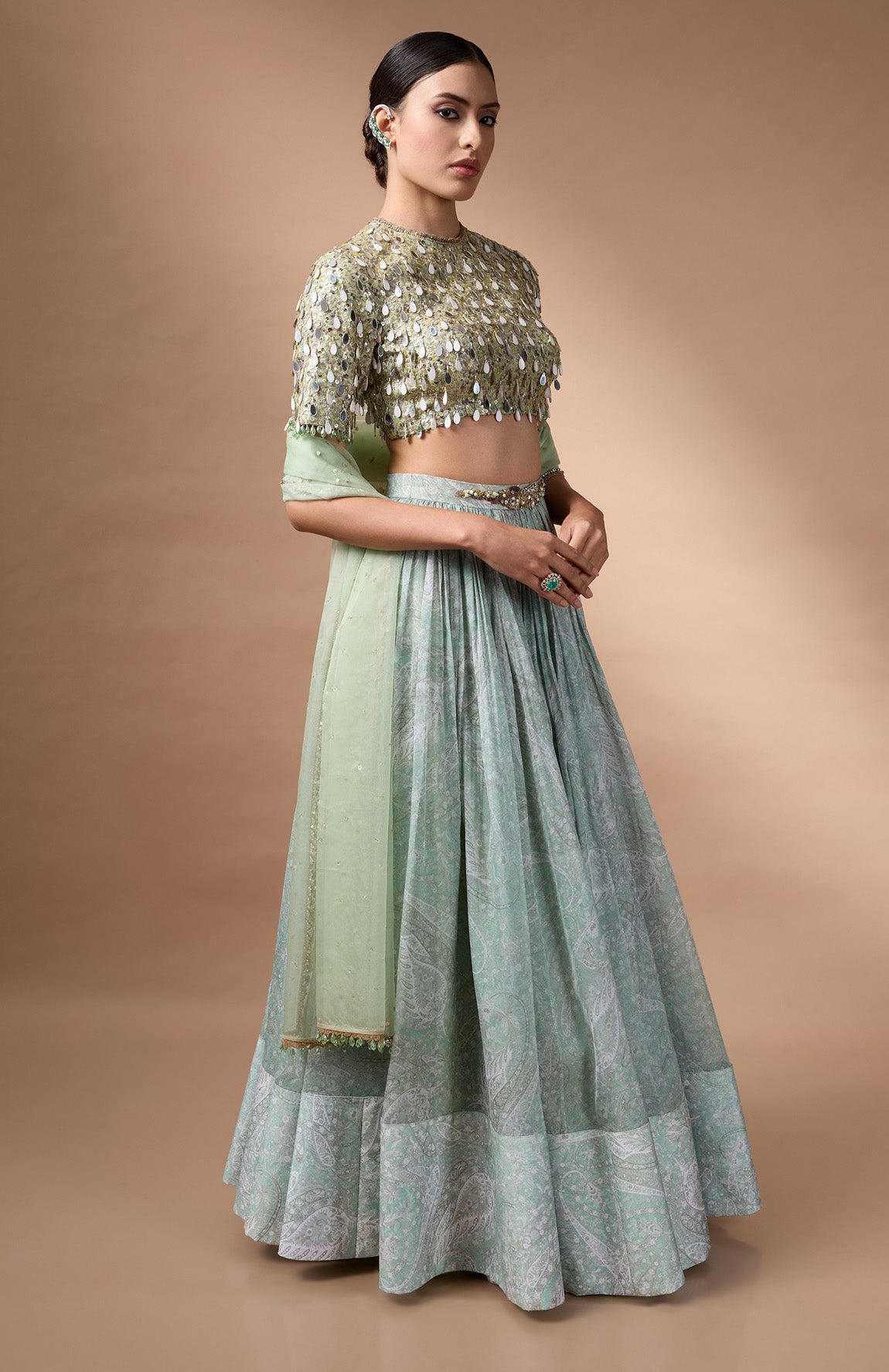 Green embriodered blouse with printed lehenga
