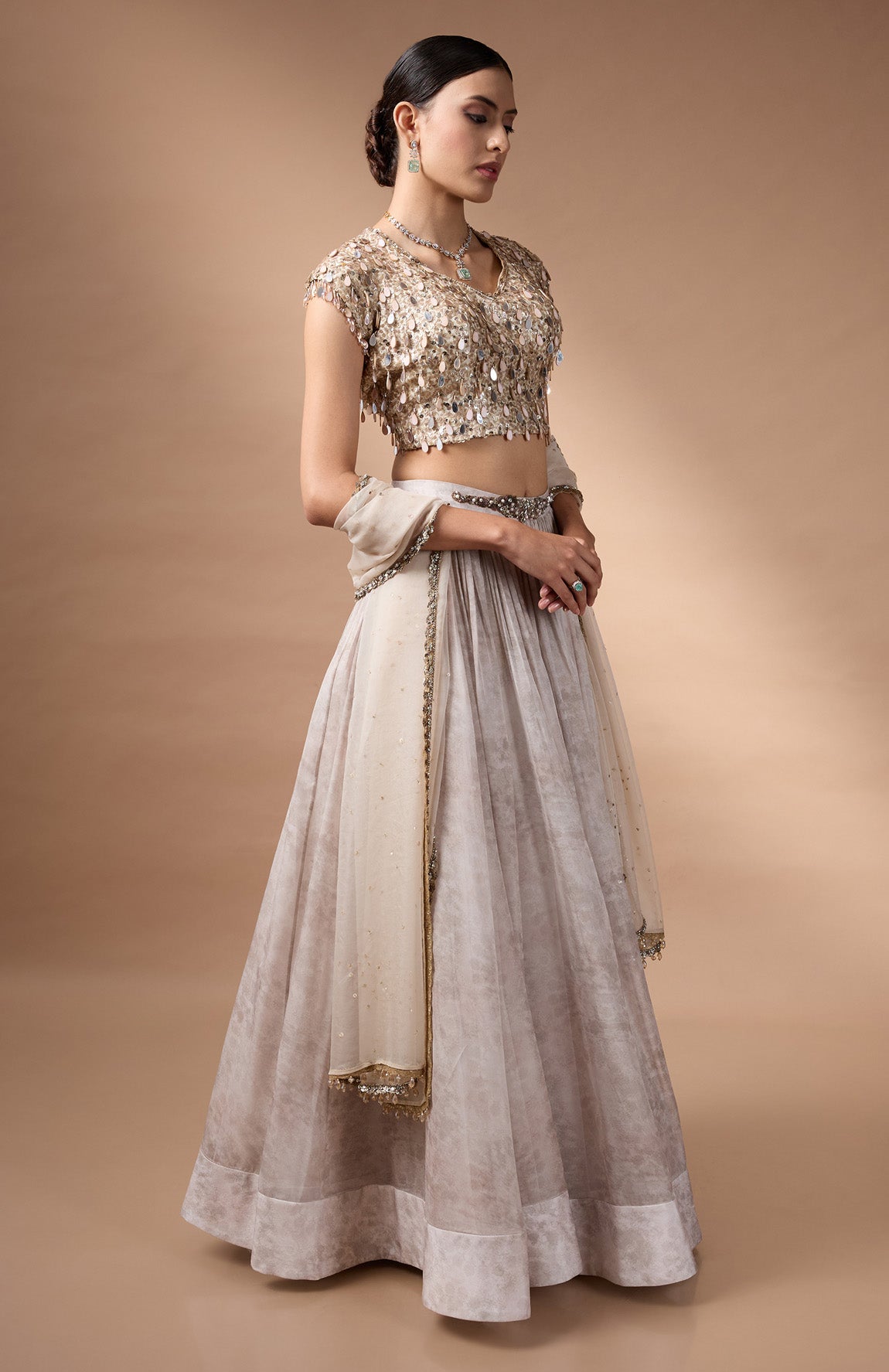 Ivory embriodered blouse with printed lehenga
