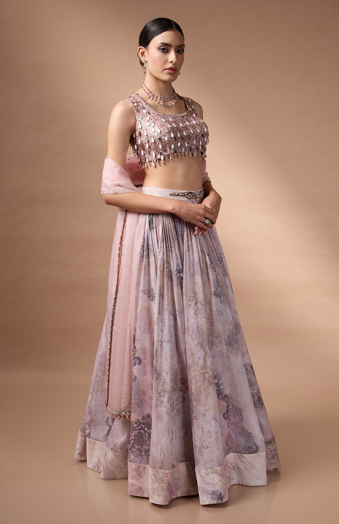 Ivory Sleevless Blouse with printed lehenga
