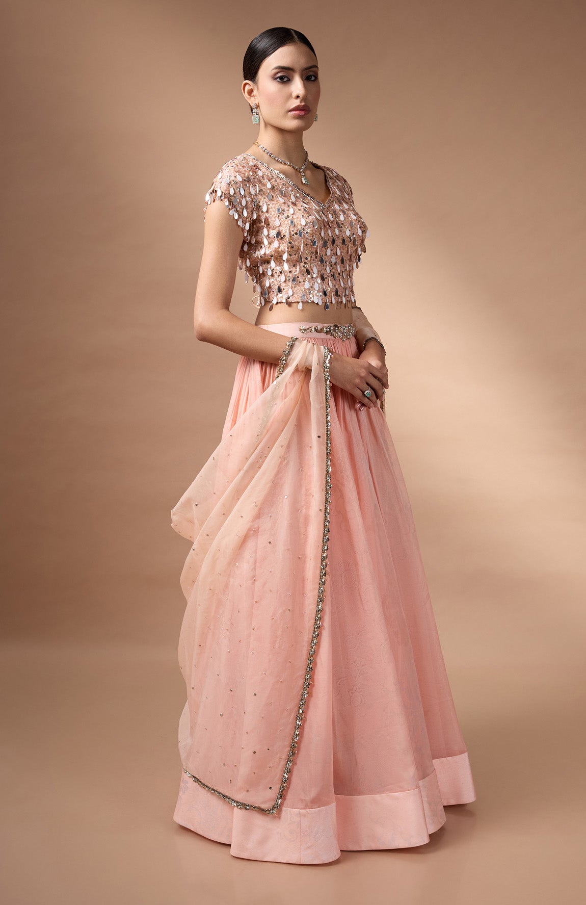Orange embriodered blouse with printed lehenga