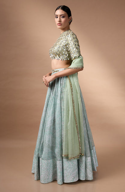 Green embriodered blouse with printed lehenga