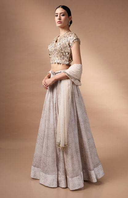 Ivory embriodered blouse with printed lehenga