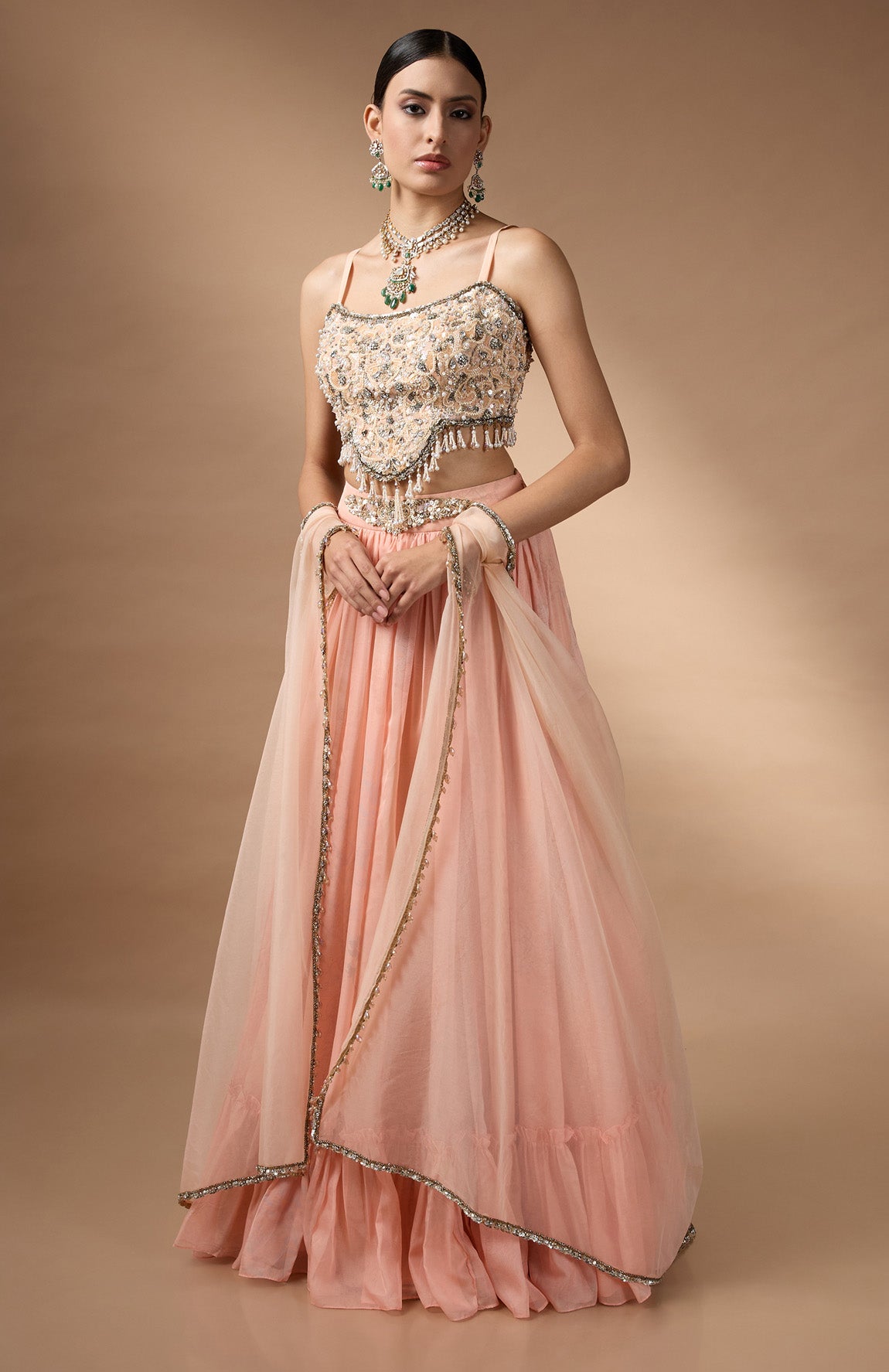 Orange Embriodered blouse with floral printed lehenga