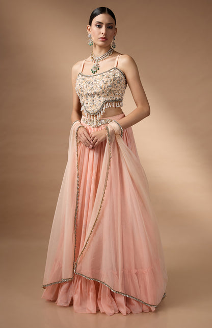 Orange Embriodered blouse with floral printed lehenga