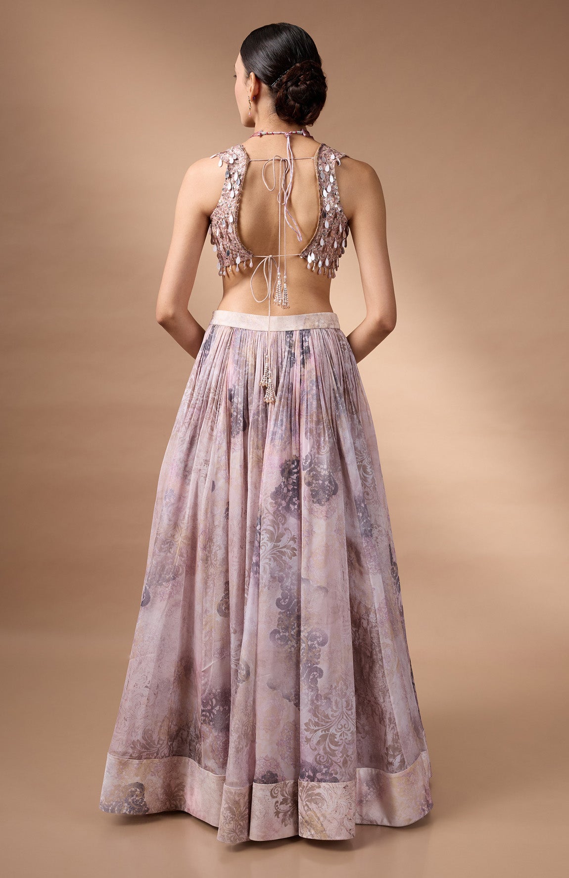 Ivory Sleevless Blouse with printed lehenga