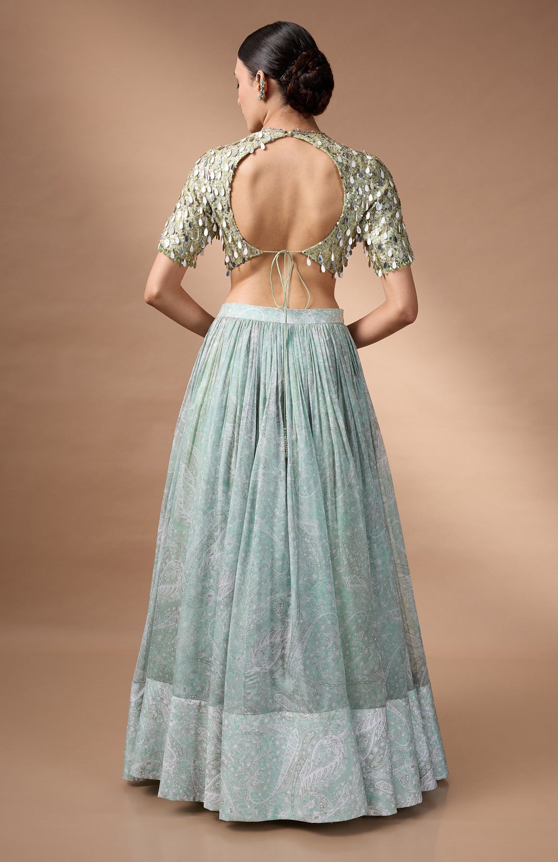 Green embriodered blouse with printed lehenga