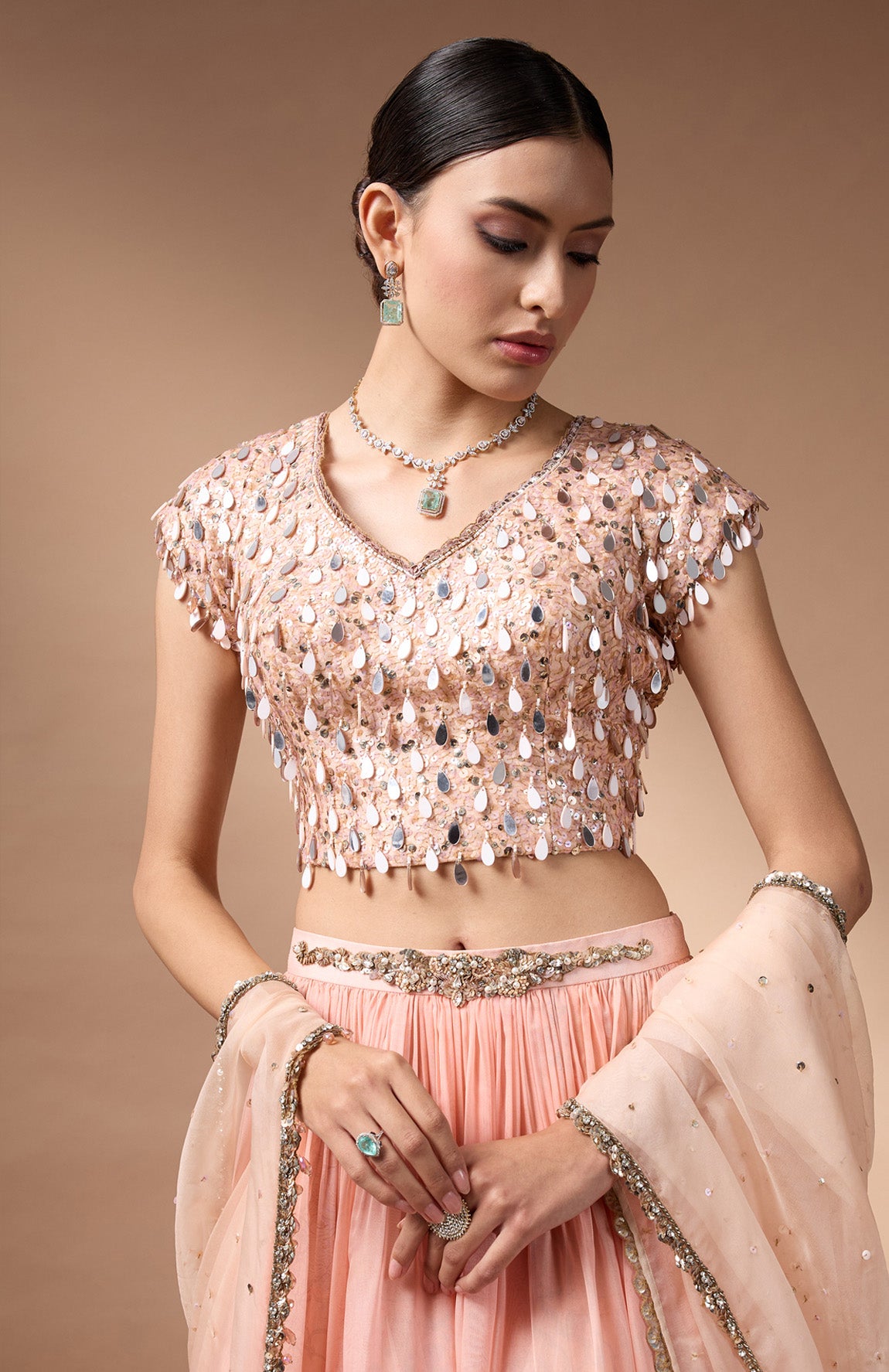 Orange embriodered blouse with printed lehenga