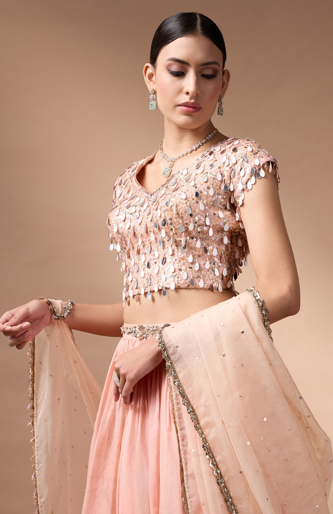 Orange embriodered blouse with printed lehenga