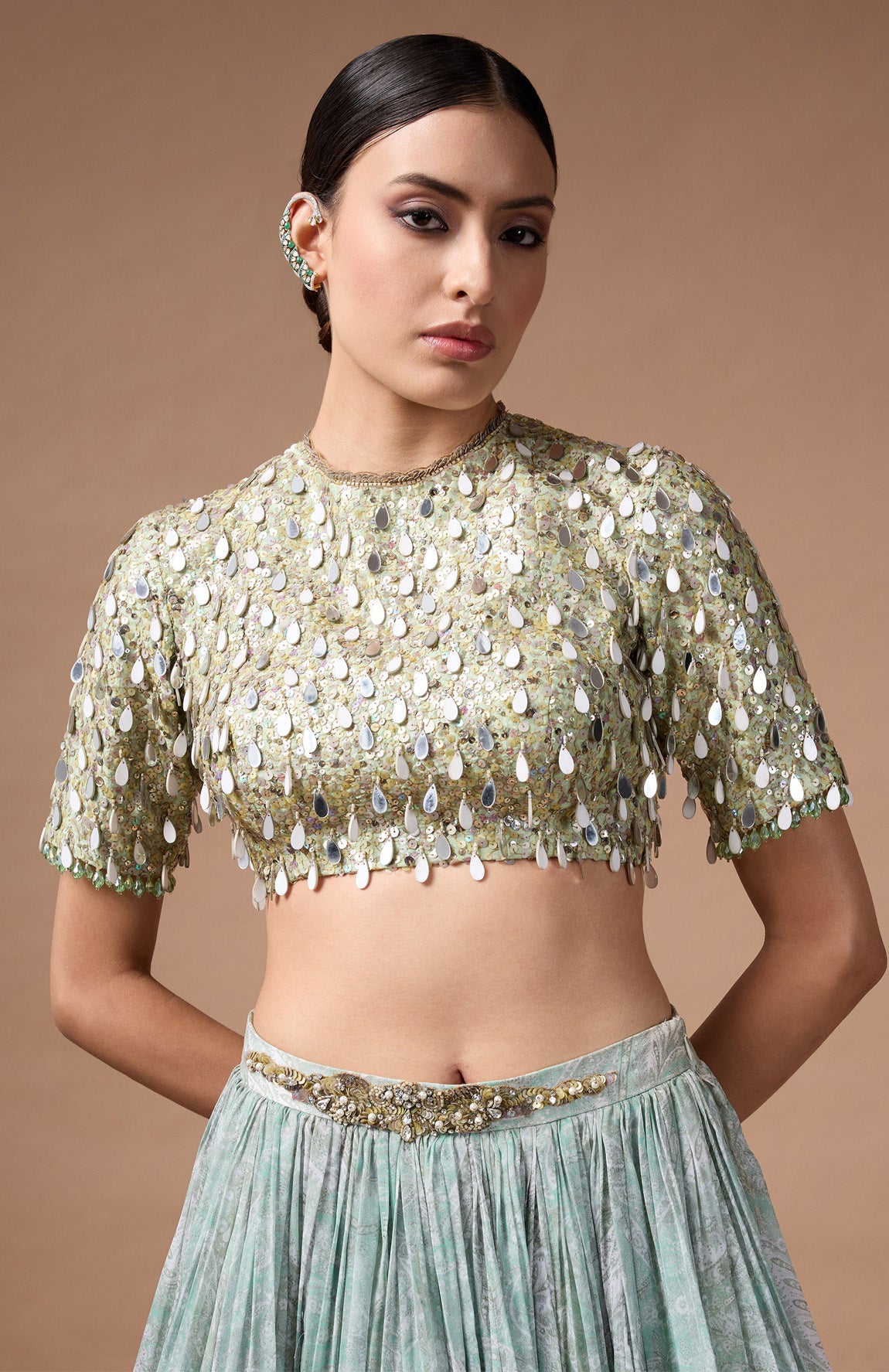 Green embriodered blouse with printed lehenga