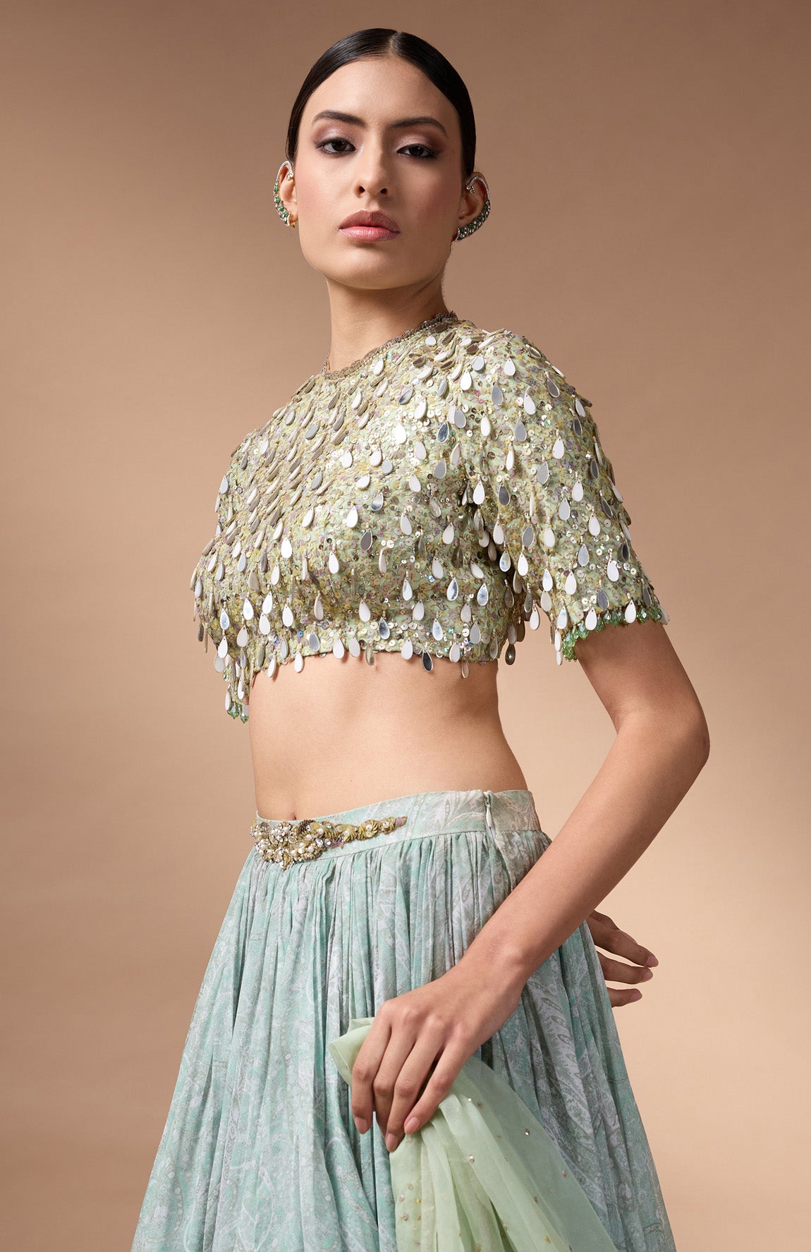 Green embriodered blouse with printed lehenga