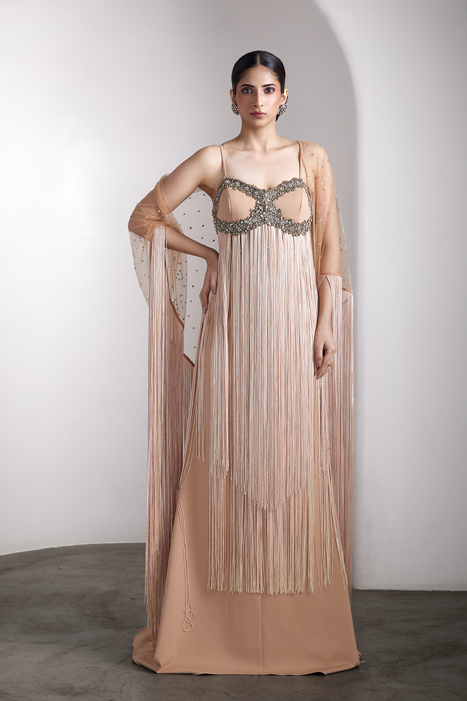 Nude fringe embellished gown