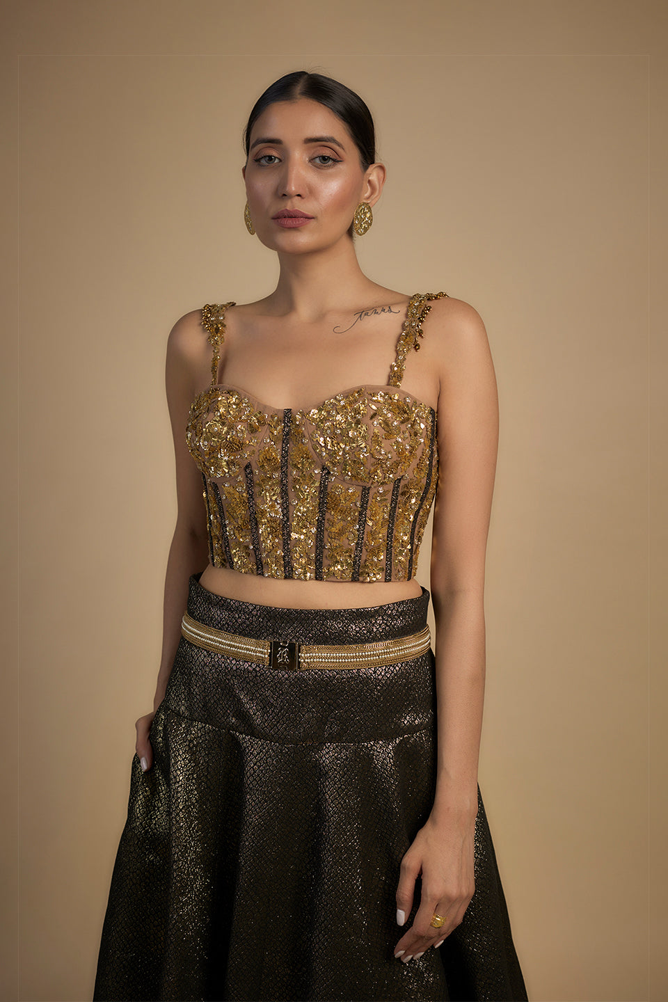 Gold corset with tassel sleeves lehenga set