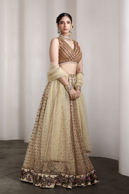 Ivory and gold lehenga set