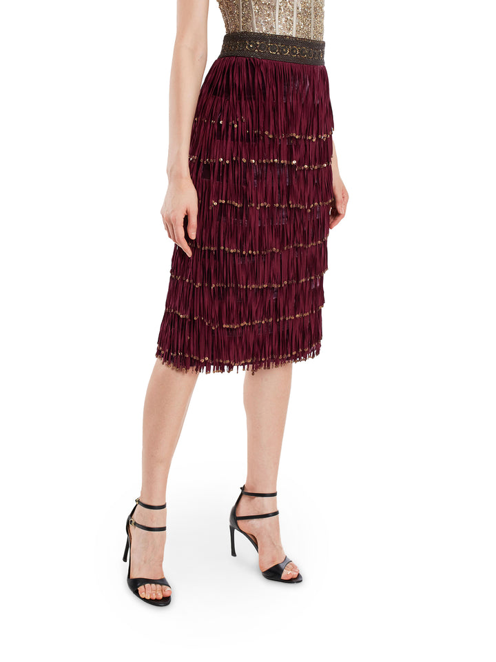 Bring the ballroom to the boardroom with this silk tasseled and hand embroidered waist band on the skirt. Hoping for all the future dress code being ‘tassel’ only.