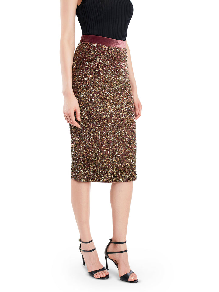 Featuring hand embroidered sequence skirt, crafted from velvet and high glam sequins. A fabric choice that instantly looks classy and edgy. 