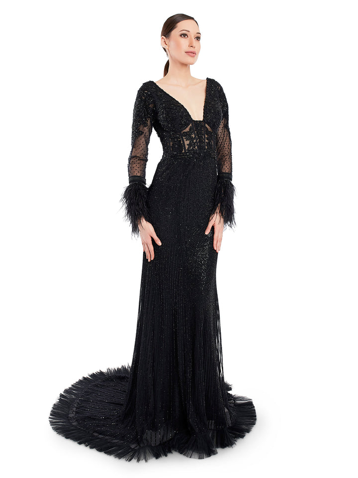 Channel your inner spirit and and youthful party energy in this beaded embroidered gown with feather detailing cuff sleeves. Its an attractive addition to your because its black.