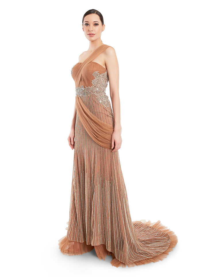 Feature sophistication and elegance in this Rocky Star hand embroidered bead work crafted from net fabric. The sheen and drapes makes the gown even more interesting.