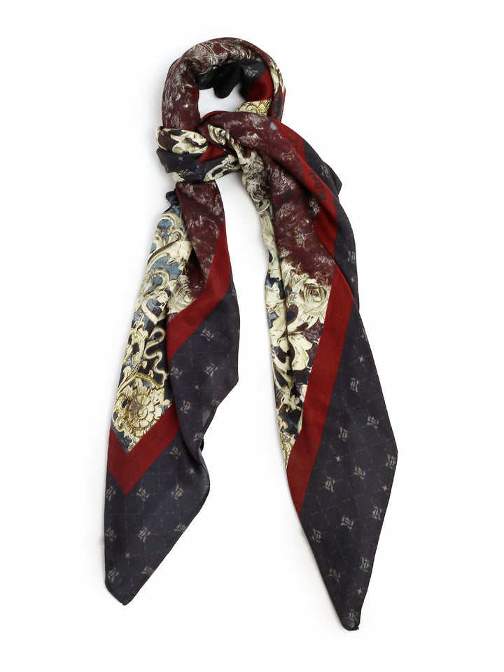 This print is one of the most modern prints from the Rocky Star collection. This scarf is bold and will surely make one stand out amongst the classics. Epitomizing elegant baroque art. 