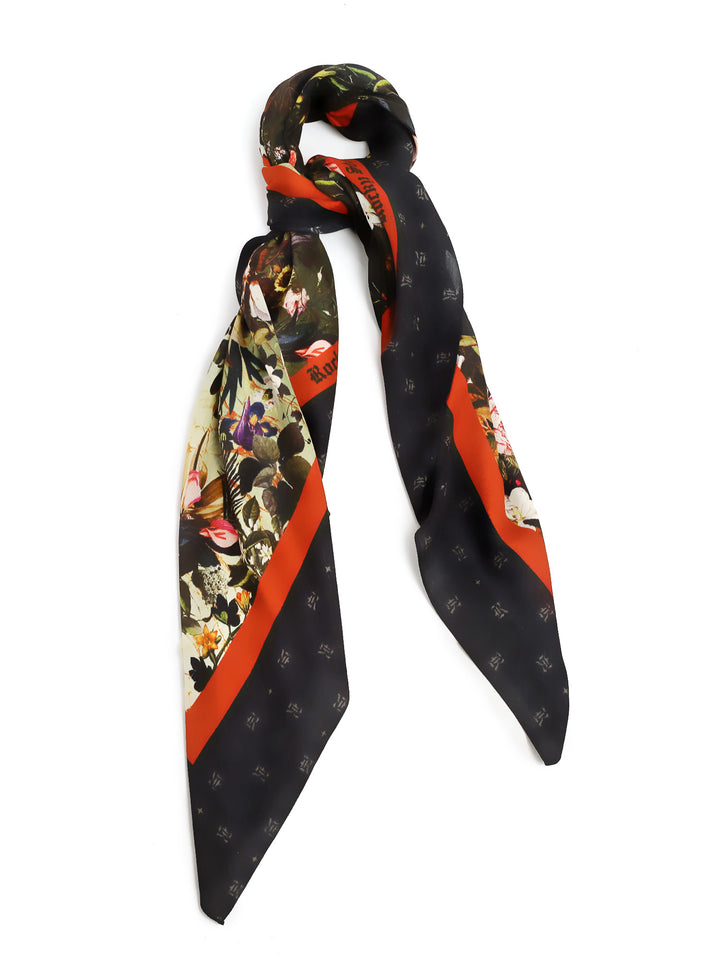 This Rocky Star scarf features intricate floral motifs and deep red border with the brand monogram making it an elegant reign piece.  Style this scarf with your outfit to add an edgy note to your look. The beauty of this foulard is that the detail makes it a timeless essential.