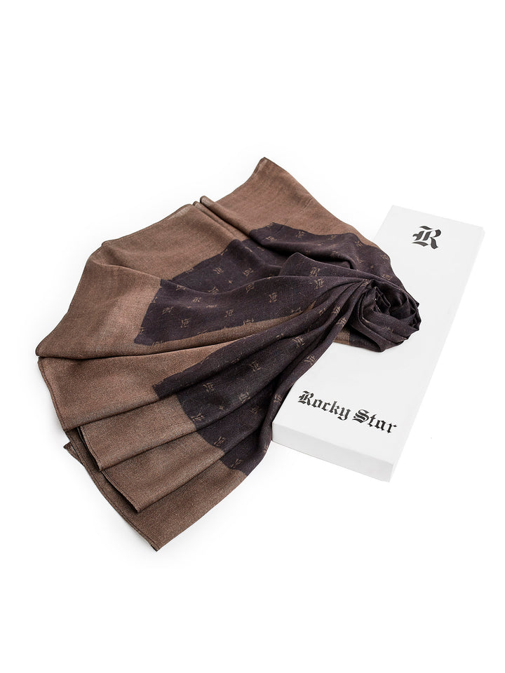 This black scarf is crafted from uncompromised quality that features Rocky Star monogram all over the scarf. The RS motifs is brand's most favored pattern which is subtly shimmering and yet keeping things sophisticated.
